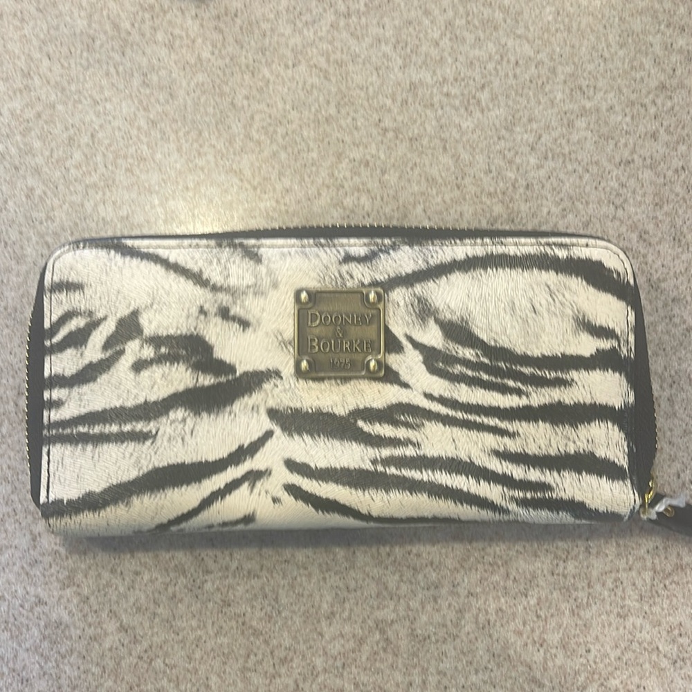 Dooney and Bourke Zebra print zip around wallet